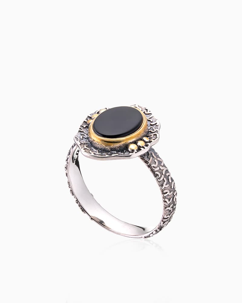 Кольцо из серебра 925 с ониксами